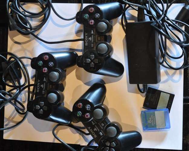 SONY PLAYSTATION 2-PS2- EXTRA PARTS- POWER SUPPLY, 3 CONTROLLERS, 2 MEMORY CARDS