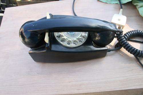 Rotary black telephone