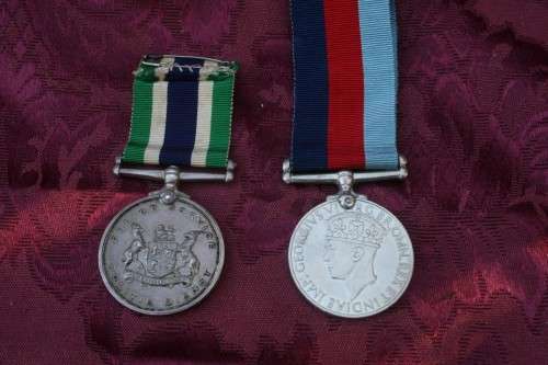 Medals issued to father and daughter.