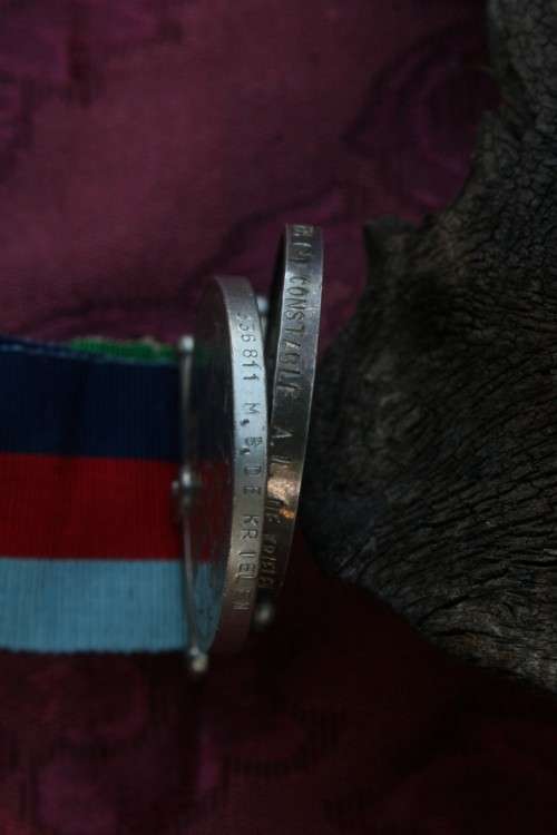 Medals issued to father and daughter.