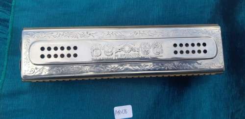 The Echo Harp . Bell metal Reeds C and G