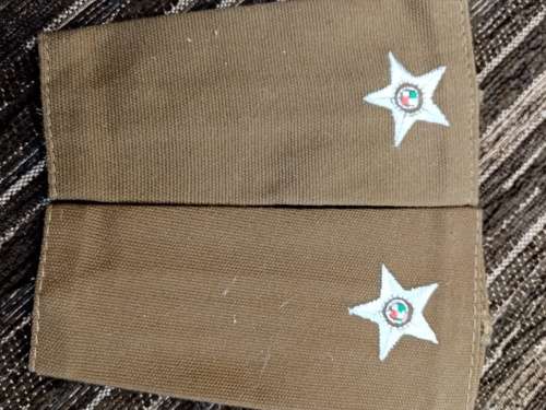 Nuetria cloth shoulder ranks