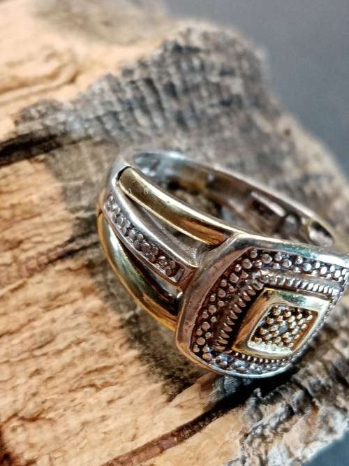 Sterling silver and 9ct gold ring Size L