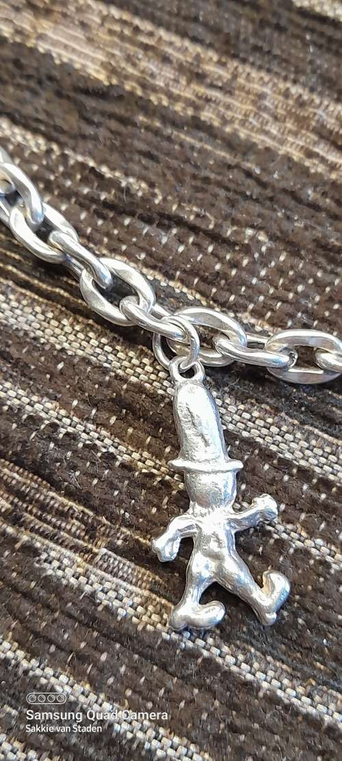 Heavy sterling silver bracelet with solid sterling silver charms 20.9cm