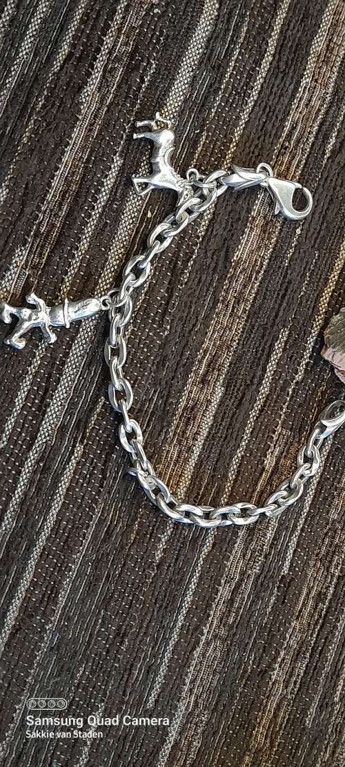 Heavy sterling silver bracelet with solid sterling silver charms 20.9cm