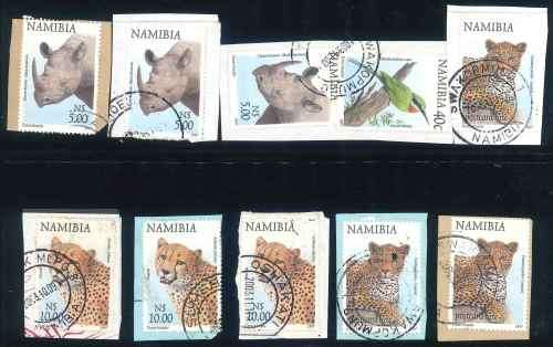 Namibia 1997 small lot of (34) x used $5 and $10 stamps on Piece with interesting Postmarks