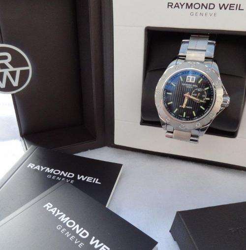 Raymond Weil Gents Watch. S-Steel Case and Bracelet. Black Dial. Brand New. Box and Papers.