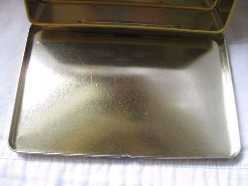 Feodora hinged suitcase collectible tin. Fabulous item