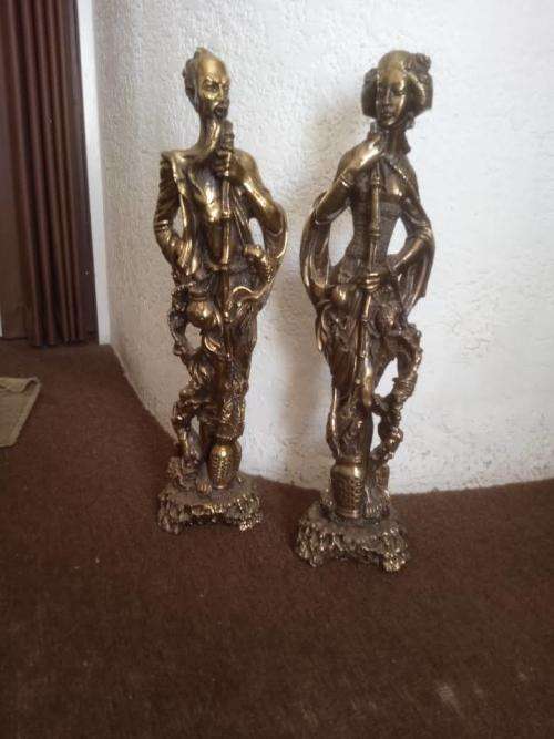 A pair of metal China/ Chinese statue ornaments