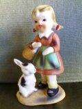 Sweet HUMMEL-like girl with rabbit.  (1893-1922)