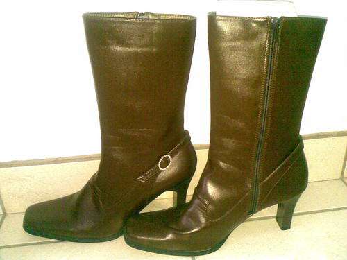 Brown knee-high heeled boots with silver buckle (size 8 )
