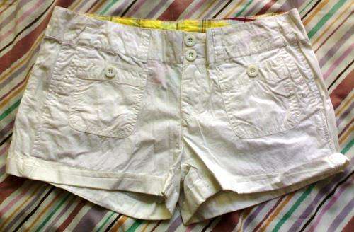 Ladies Pair white shorts (size 34)