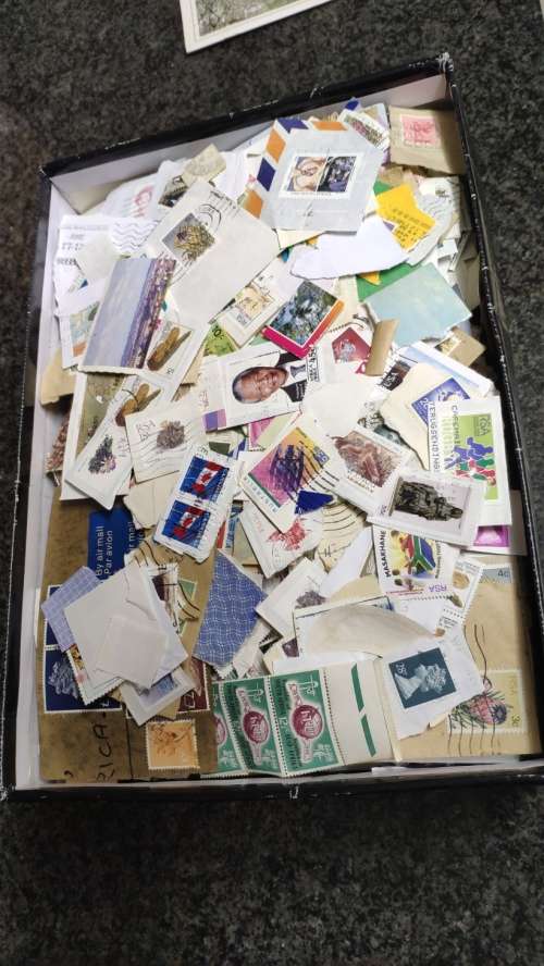 Shoe box full of stamps from all over the world but mostly South African