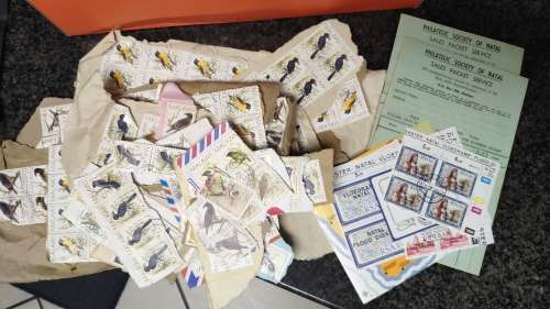 Shoe box full of stamps from all over the world