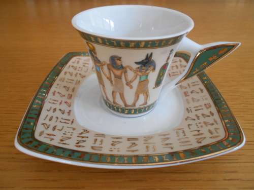 Highly decorated Egytian themed demi-tasse cup and saucer - Limoges