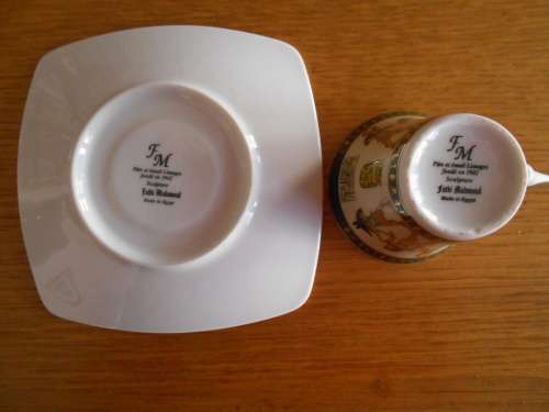 Highly decorated Egytian themed demi-tasse cup and saucer - Limoges