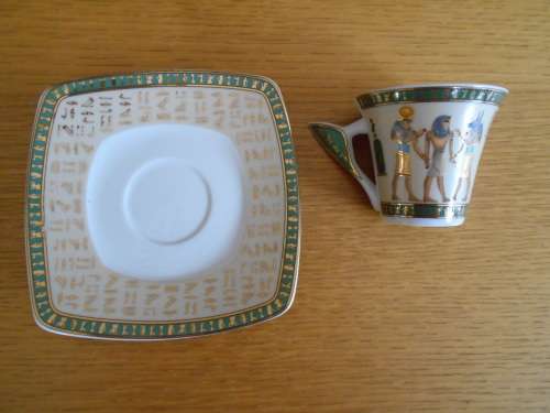 Highly decorated Egytian themed demi-tasse cup and saucer - Limoges