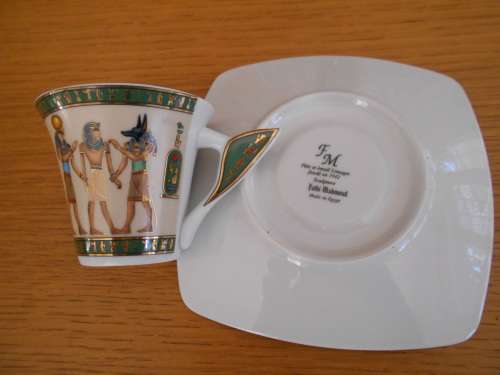 Highly decorated Egytian themed demi-tasse cup and saucer - Limoges