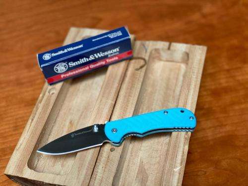 SMITH AND WESSON Stainless Steel Folding Knife with Clip Point Blade and Nylon Handle