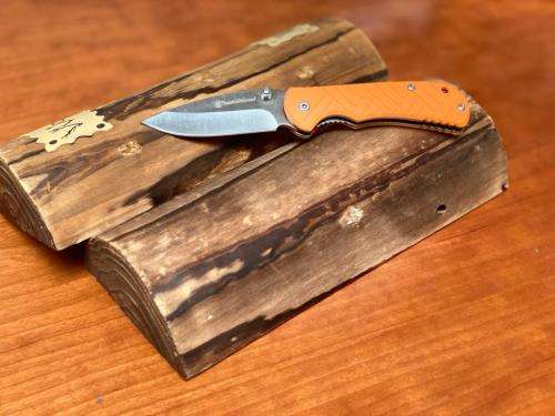 SMITH AND WESSON Stainless Steel Folding Knife with Clip Point Blade and Nylon Handle