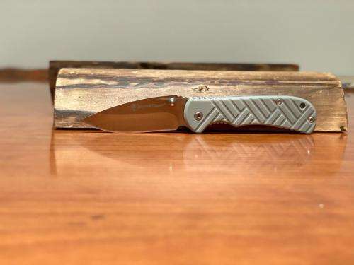 SMITH AND WESSON Stainless Steel Folding Knife with Clip Point Blade and Nylon Handle