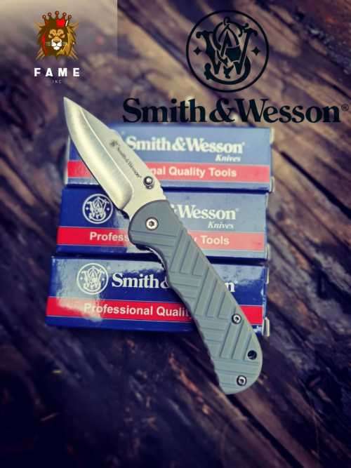 SMITH AND WESSON Stainless Steel Folding Knife with Clip Point Blade and Nylon Handle