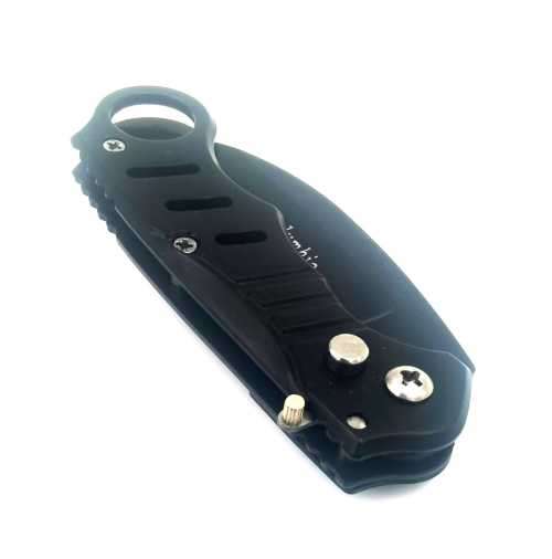 `Shadow Strike: The Deadly Precision of the Black Push Button Karambit`