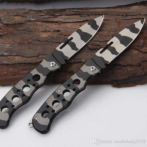 `Camo Companion: The W55 Pocket Knife for Outdoor Adventures`