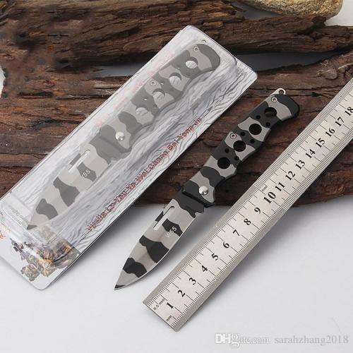 `Camo Companion: The W55 Pocket Knife for Outdoor Adventures`