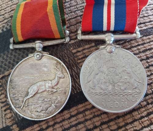 2 X WW2 MEDALS ISSUE TO J.F SMIT 194097 SILVER AFRICA SERVICE AND DEFENCE MEDAL