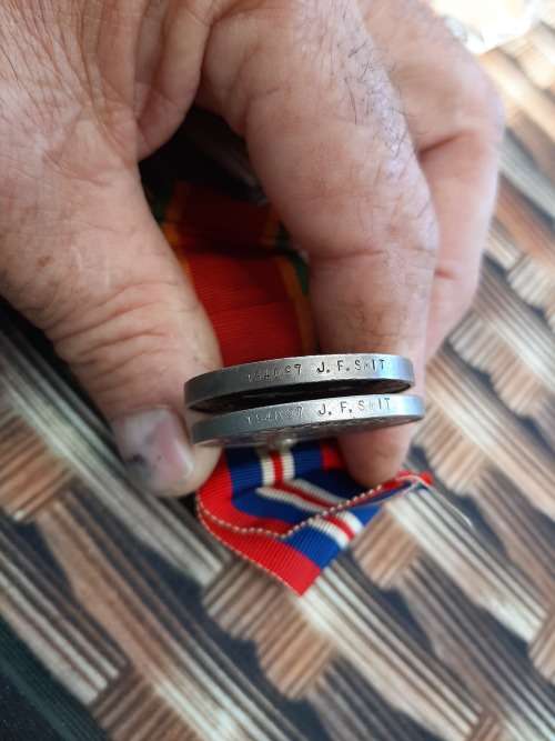 2 X WW2 MEDALS ISSUE TO J.F SMIT 194097 SILVER AFRICA SERVICE AND DEFENCE MEDAL