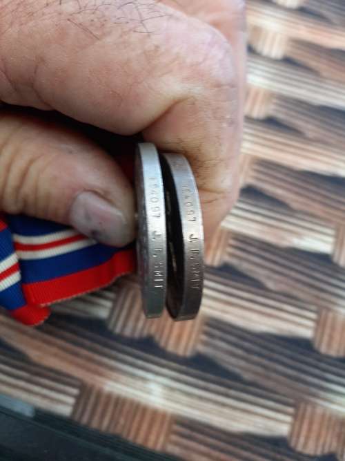 2 X WW2 MEDALS ISSUE TO J.F SMIT 194097 SILVER AFRICA SERVICE AND DEFENCE MEDAL