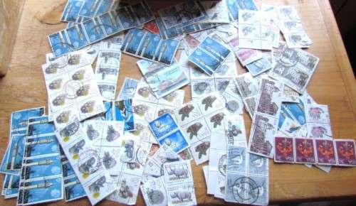 Rhodesia - Plastic Container /  Box of Stamps - also Zimbabawe - Unsorted