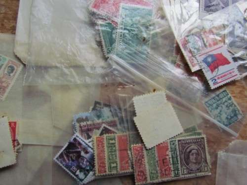 LARGE WORLD LOT UNSORTED/UNCHECKED STAMPS IN WOOD BOX