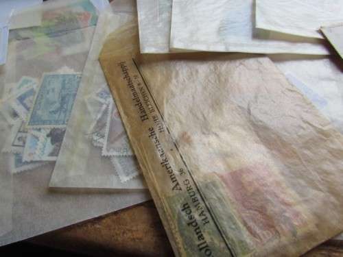 LARGE WORLD LOT UNSORTED/UNCHECKED STAMPS IN WOOD BOX