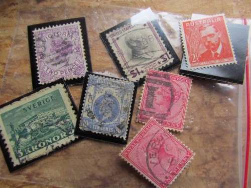 LARGE WORLD LOT UNSORTED/UNCHECKED STAMPS IN WOOD BOX