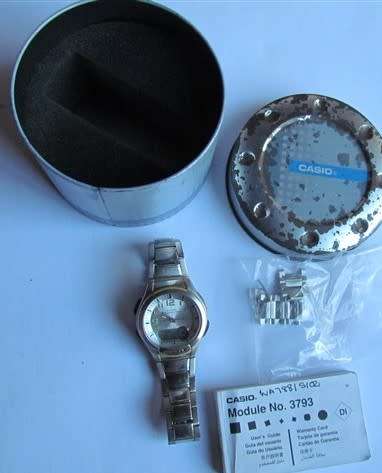 **R1 START** CASIO ILLUMINATOR - WORKING + TIN + BOOKLET +++ SEE PICS