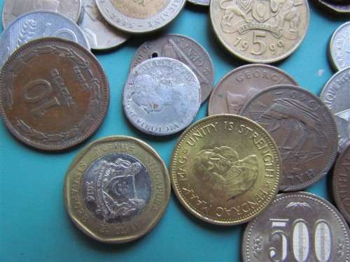 Assorted World Coins in a Tin - Check as some good coins in this Lot