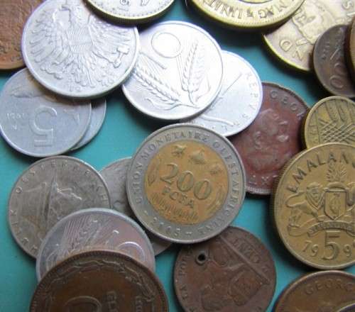 Assorted World Coins in a Tin - Check as some good coins in this Lot