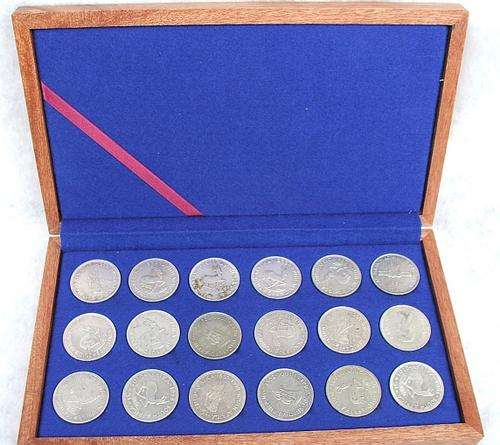 SILVER CROWNS PROTECT THEM IN A SPECIAL WOODEN DISPLAY CASE