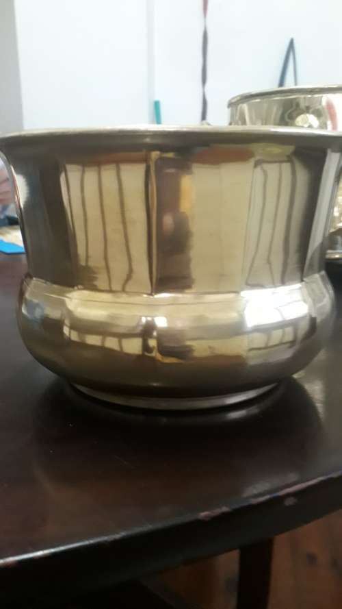 A brass planter in good condition