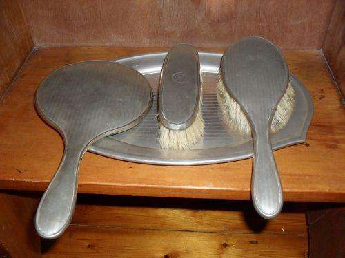Beautiful Silver Plated Matching Mirror, Brush, Comb and Tray. This set is in perfect condition.