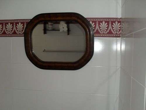 Beautiful Wooden Frame Accompanied by Mirror.