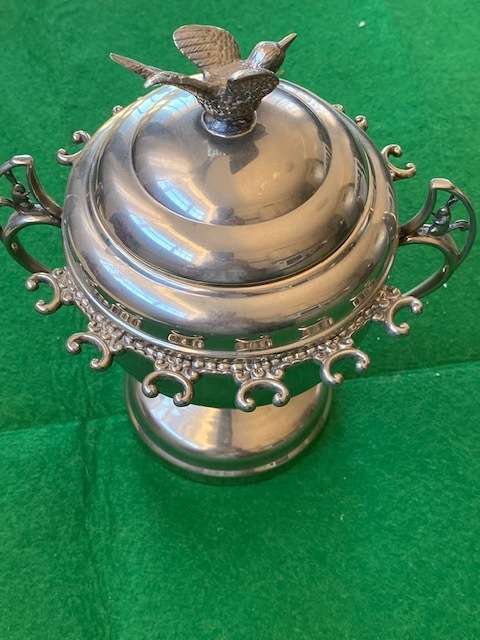 ANTIQUE SILVERPLATED SUGAR BOWL WITH SPOON RACKS AND BIRD DETAIL