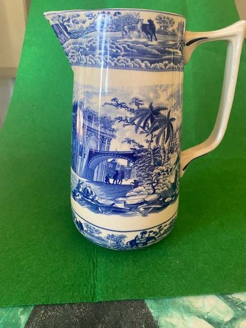 PITCHER WITH INDIAN DELFT PICTURE AND RAMPANT LIONS MARKING