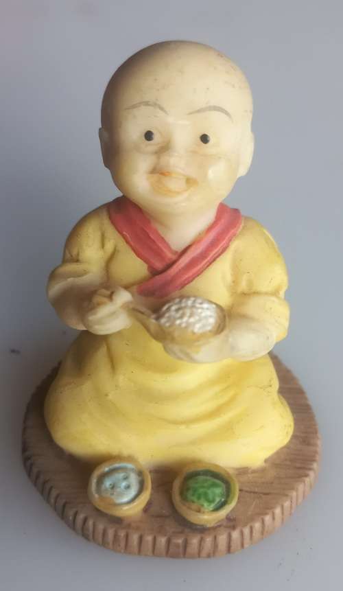 Small monk figurine