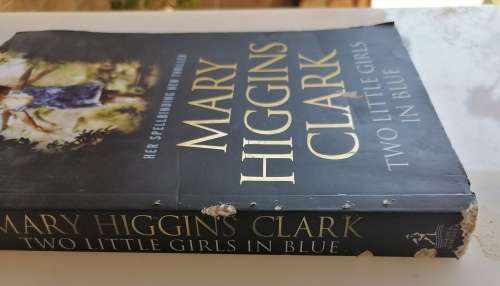 Two little girls in blue by Mary Higgins Clark