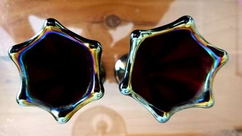 Pair of Amethyst Carnival Glass Swung Vases.