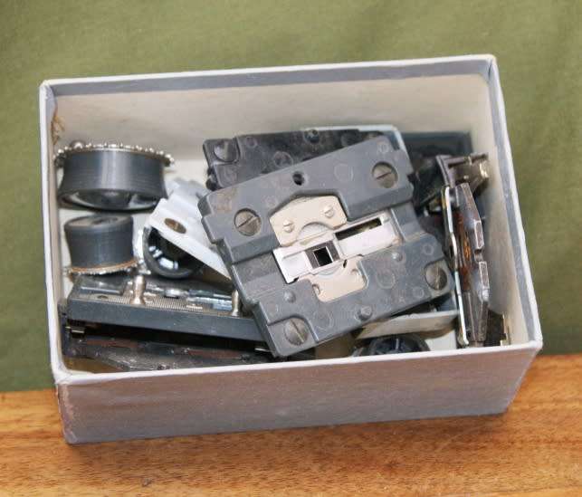 Box of Gates and Sprockets Camera Spares