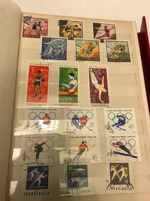 Book with collection of 286 Olympic games stamps